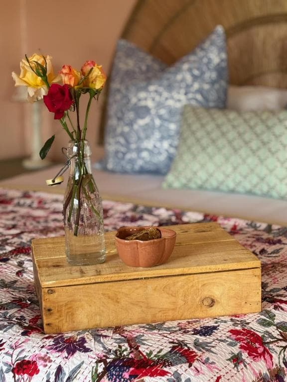 Romantic touches in the bedroom with roses on arrival