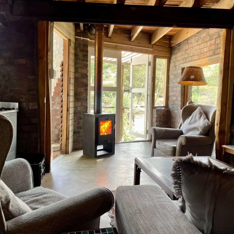 Cosy indoor fireplace in the living room
